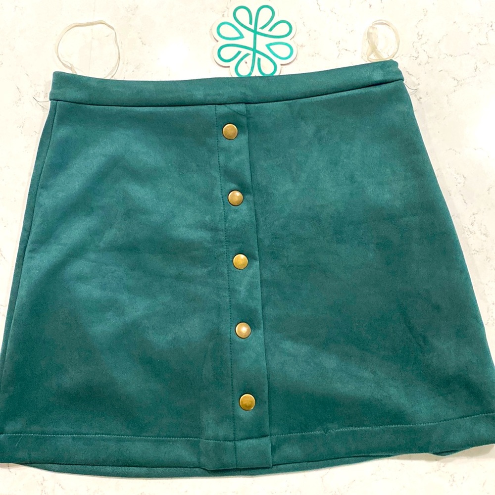 Shop Hope’s dark green velour skirt size small